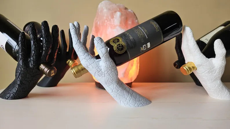 Suport Hand Gravity pentru sticla de vin